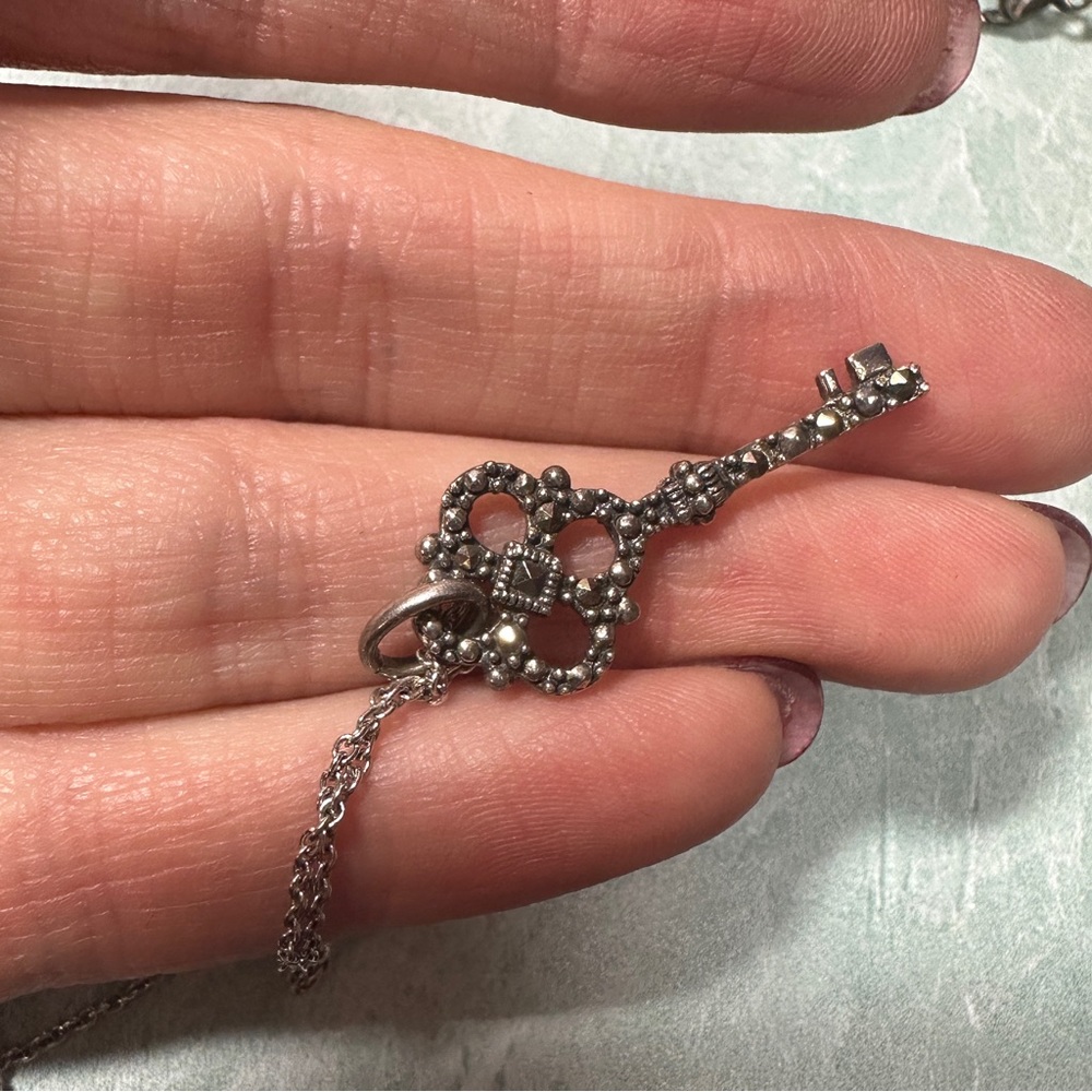 Vintage Ross Simons hematite gray stones sterling silver key pendant